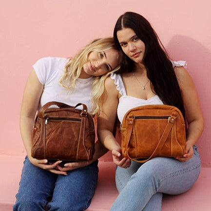 Couch store leather handbag